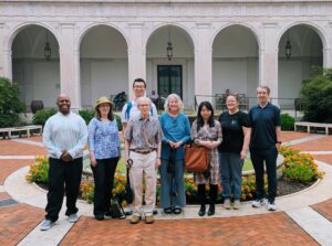 8 poets in courtyard of the art museum